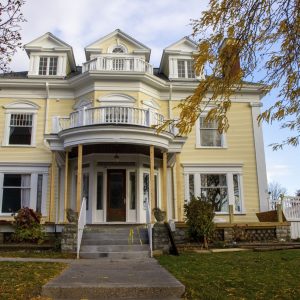 Picture of the front of the building with columns removed and porch under construction